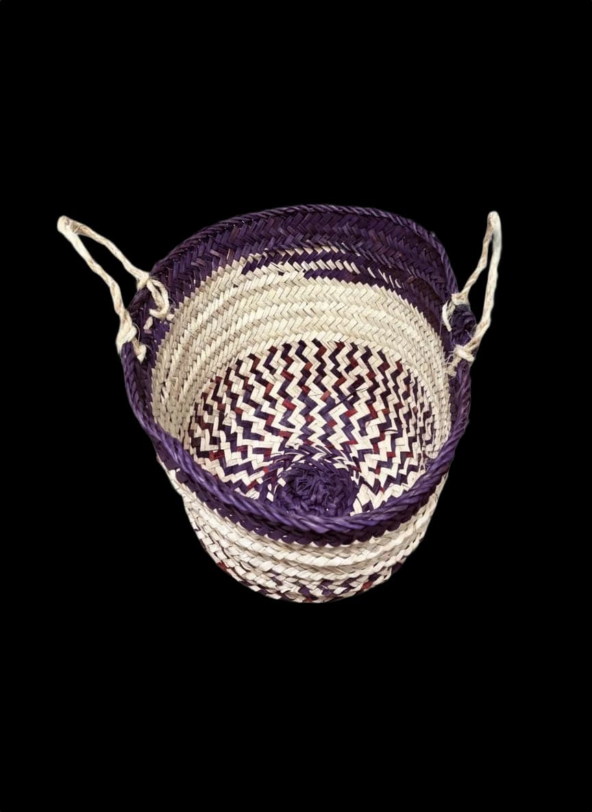Small palm-leaf basket with a purple rim — top view