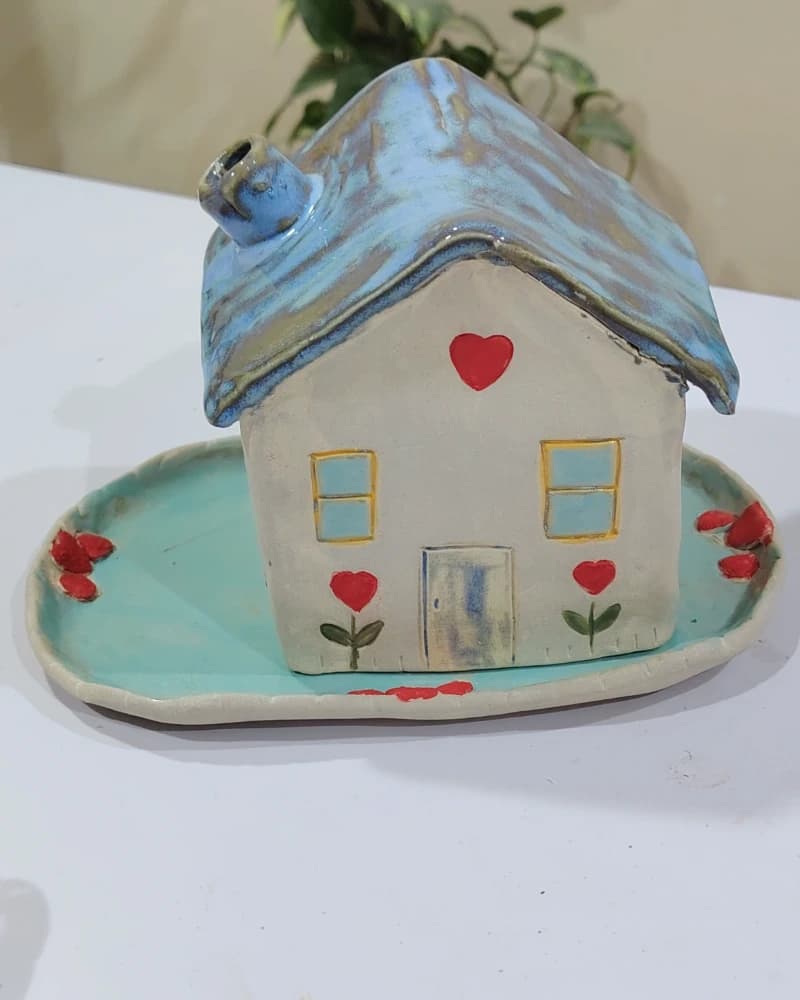 مبخر الكوخ الخزفي من متجر استوديو النجمة