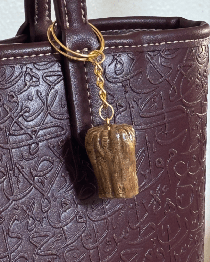 ميدالية تمرة من متجر متجر مونيرا